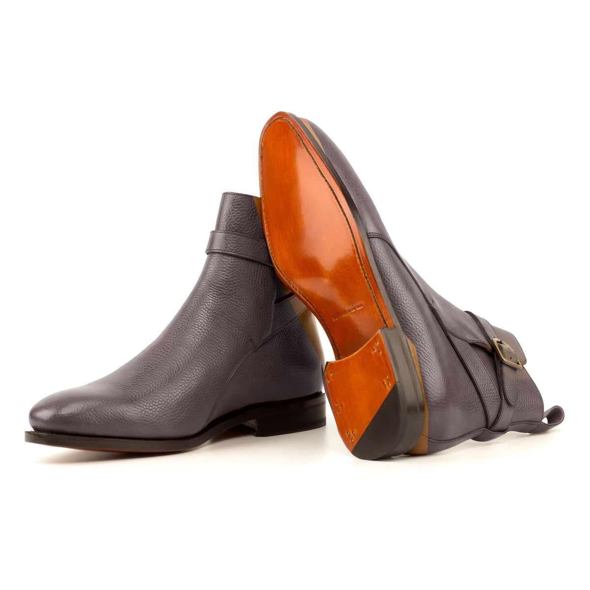 Bottines Jodhpur en cuir gros grain marron foncé : une bottine couchée montre la semelle