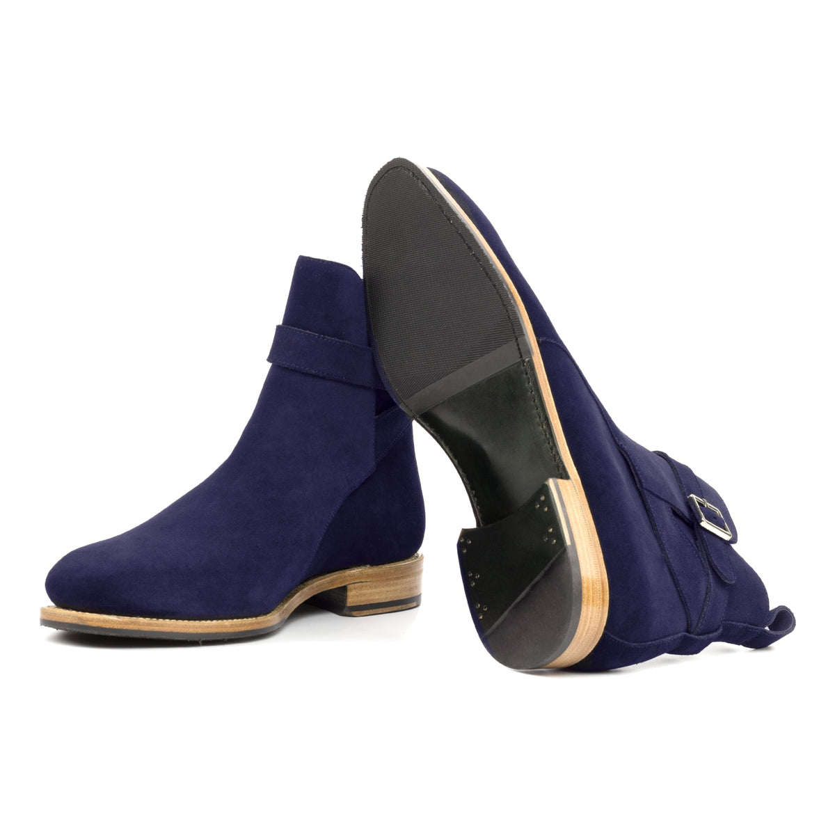 Bottines Jodhpur en daim de chevreau bleu marine : une bottine couchée montre la semelle