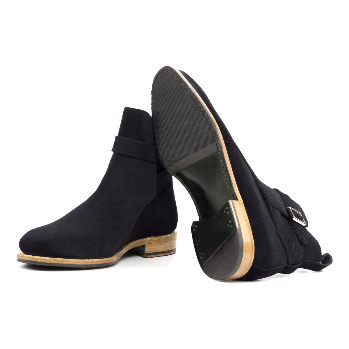 Bottines Jodhpur en daim de chevreau noir : une bottine couchée montre la semelle
