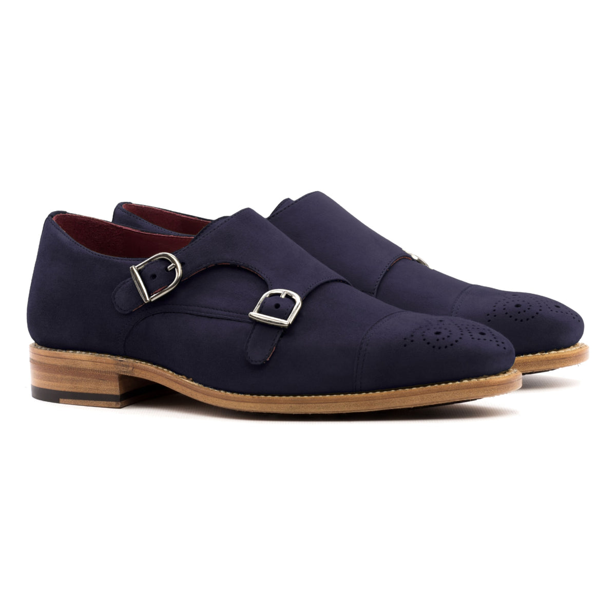Chaussure double boucle en daim bleu marine, la paire vue de trois quarts avant