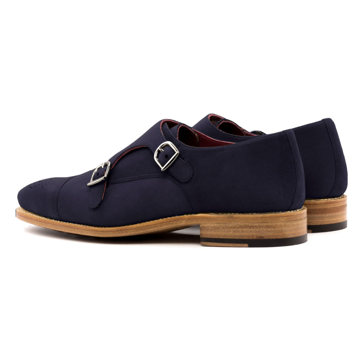 Chaussure double boucle en daim bleu marine, la paire vue de trois quarts arrière