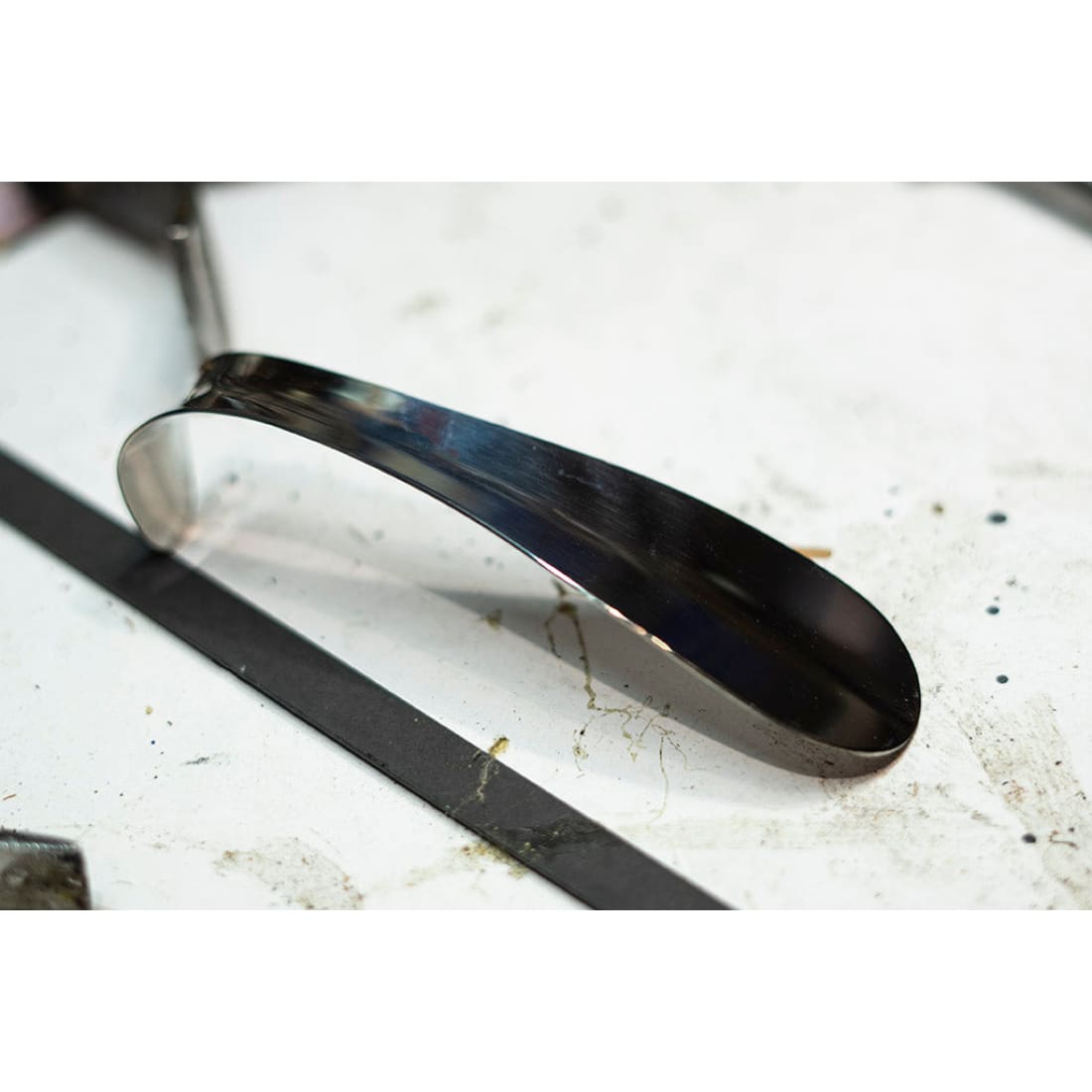 Petit chausse-pied en métal - Norbert Bottier