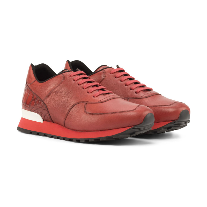 Le cuir grainé rouge sur un autre modèle, photo non retouchée. Une partie de la paire est dans un autre cuir.
