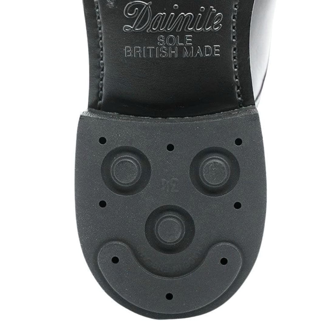 Remplacement talons  Dainite - Cordonnerie